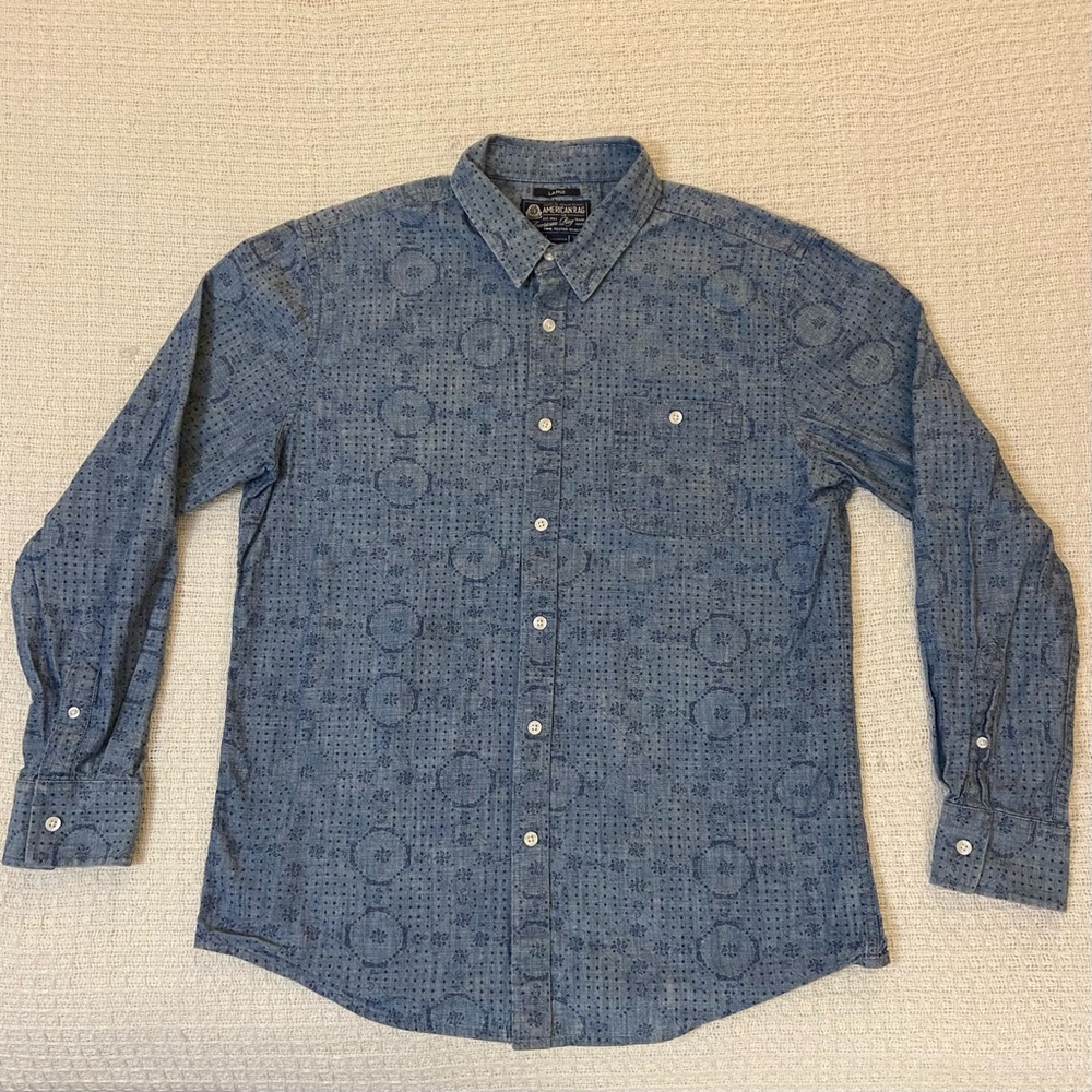 American Rag cie blue spiral pattern long sleeve w/ buttoned pocket sz L